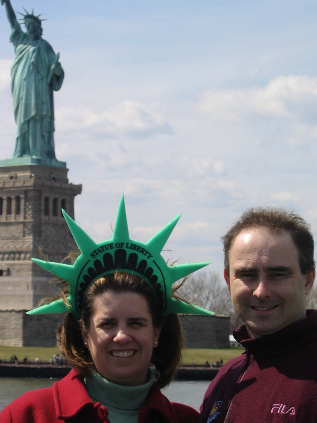 In front of the Statue of Liberty